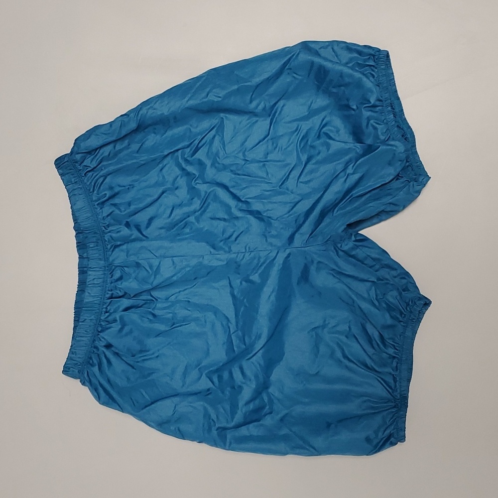 Teal trash bag shorts